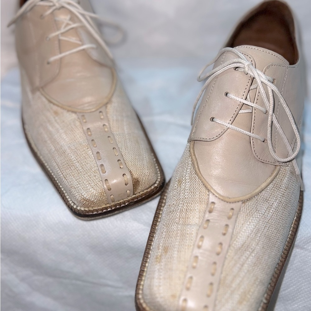 Gently used dress shoes.  Used for a single occasion and never worn thereafter.